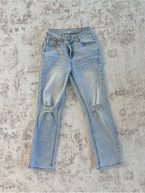 Light Blue Distressed Women’s Crossover Jeans